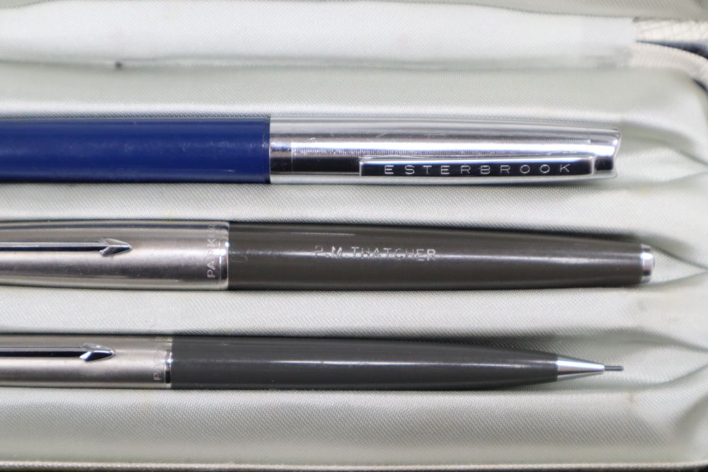 A Parker fountain pen and propelling pencil marked PM Thatcher and Easterbrook pen